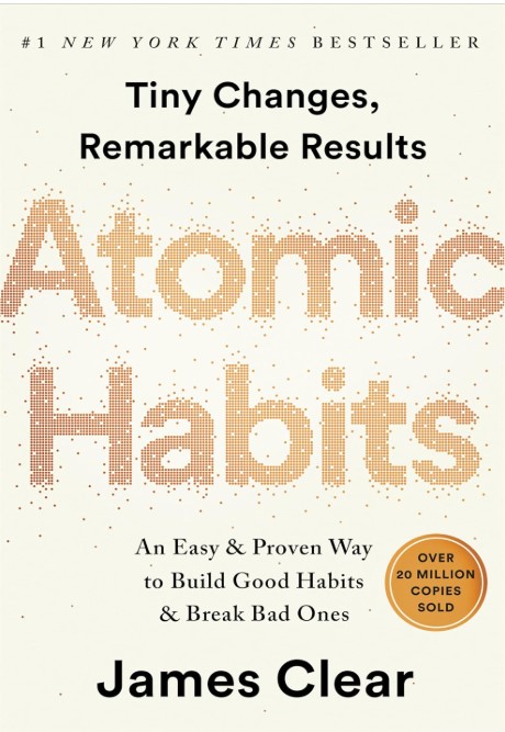 "Book cover of 'Atomic Habits' by James Clear, a #1 New York Times bestseller. The design features the title in pixelated gold letters on a white background. The subtitle reads, 'An Easy & Proven Way to Build Good Habits & Break Bad Ones.' A gold badge highlights 'Over 20 Million Copies Sold.' This bestselling self-improvement book focuses on habit formation, productivity, and personal growth."